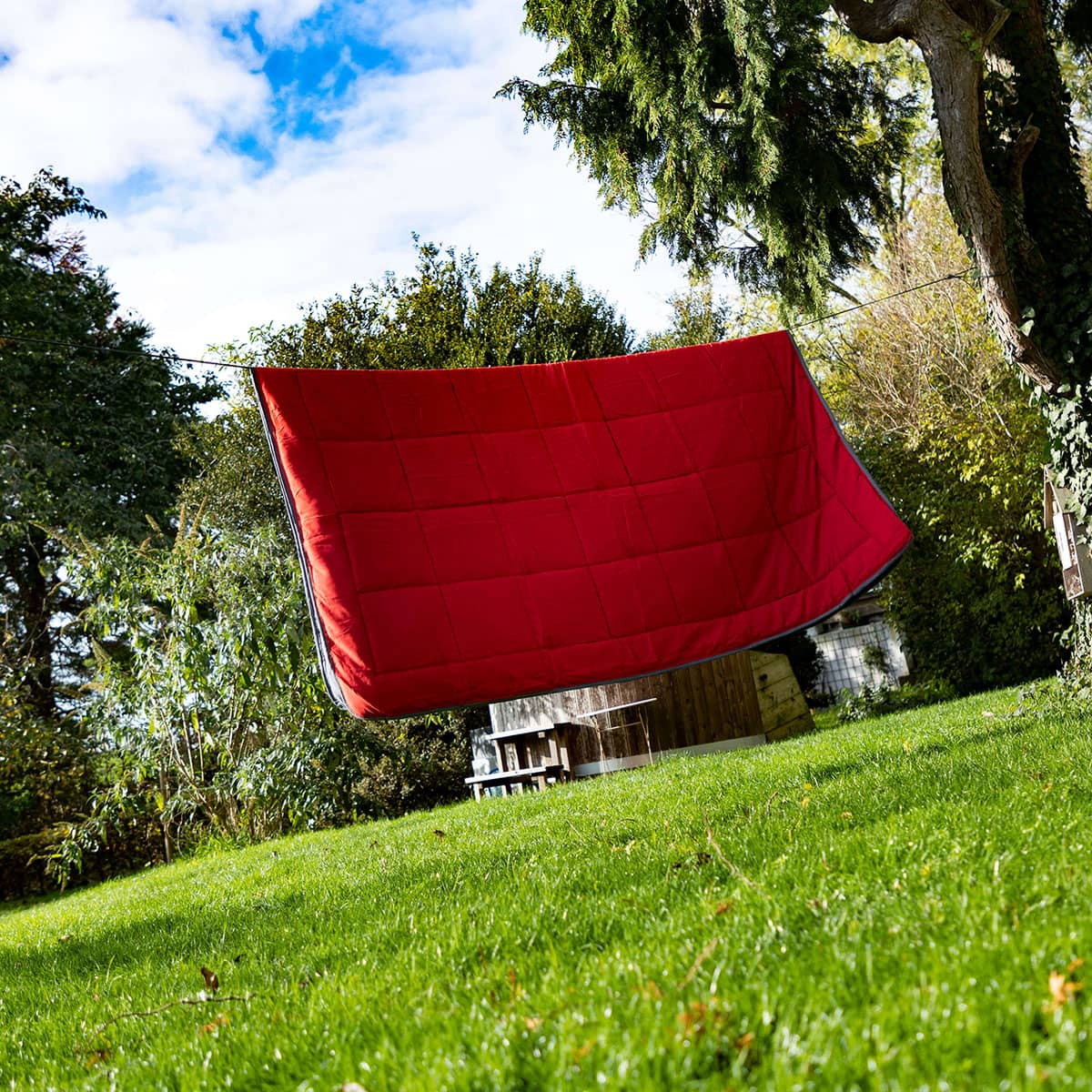 wasbaar dekbed snel drogend aan waslijn