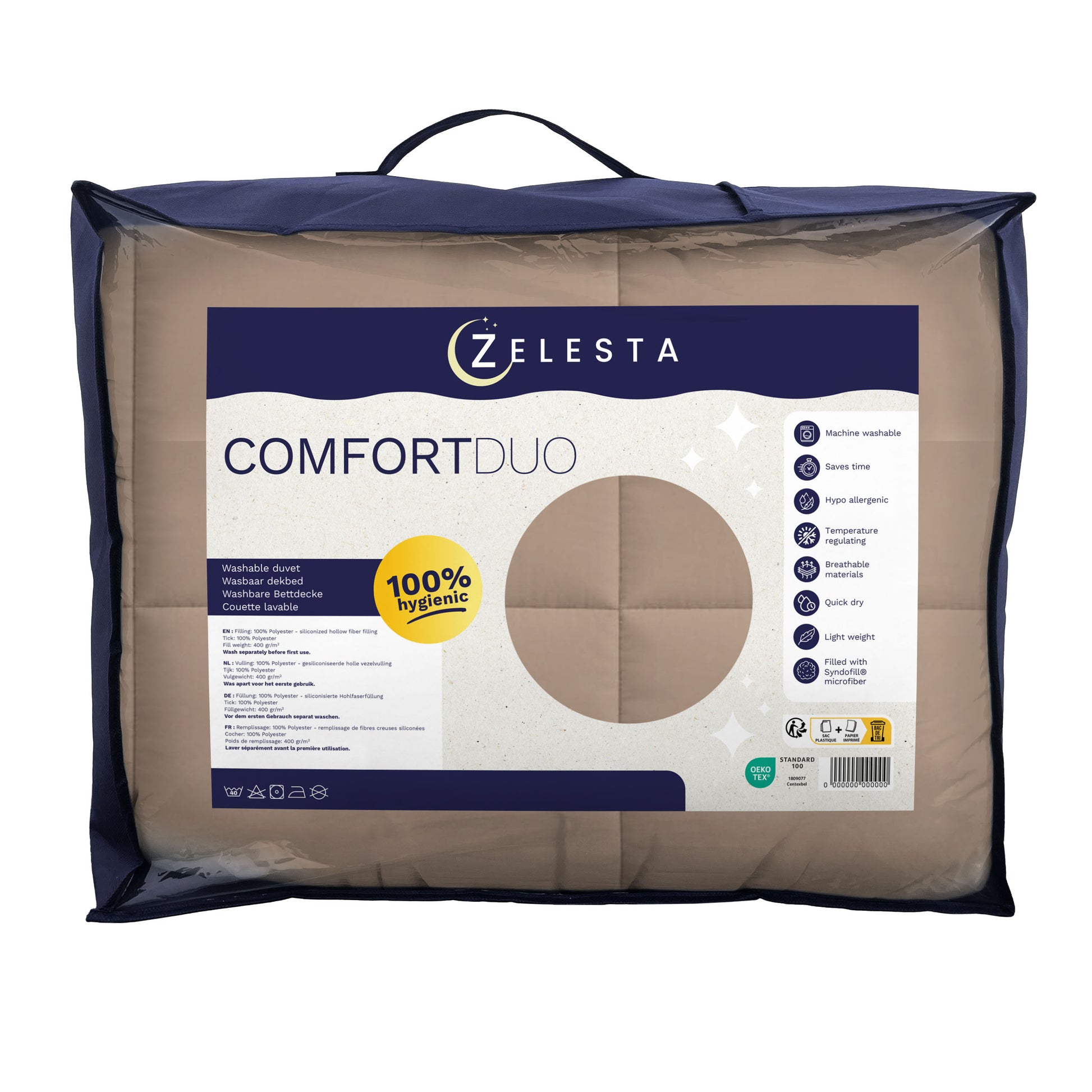 Het Zelesta Comfort Duo Dekbed - Terra & Zand wordt getoond in de verpakking, met productinformatie, een handvat aan de bovenkant om het gemakkelijk te dragen en een afneembare hoes - ideaal voor liefhebbers van klassieke dekbedden.
