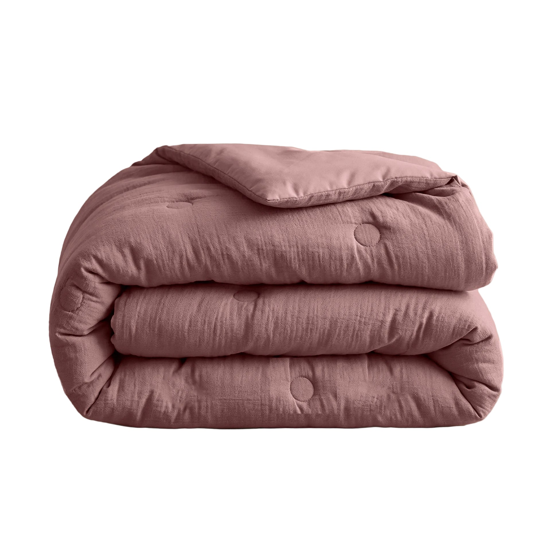 De Zelesta Japandibed Katoen Mousseline - Oud Roze heeft een doorgestikt dessin met zichtbare stiksels, gemaakt van zacht mousseline katoen en is gevouwen afgebeeld tegen een effen witte achtergrond.