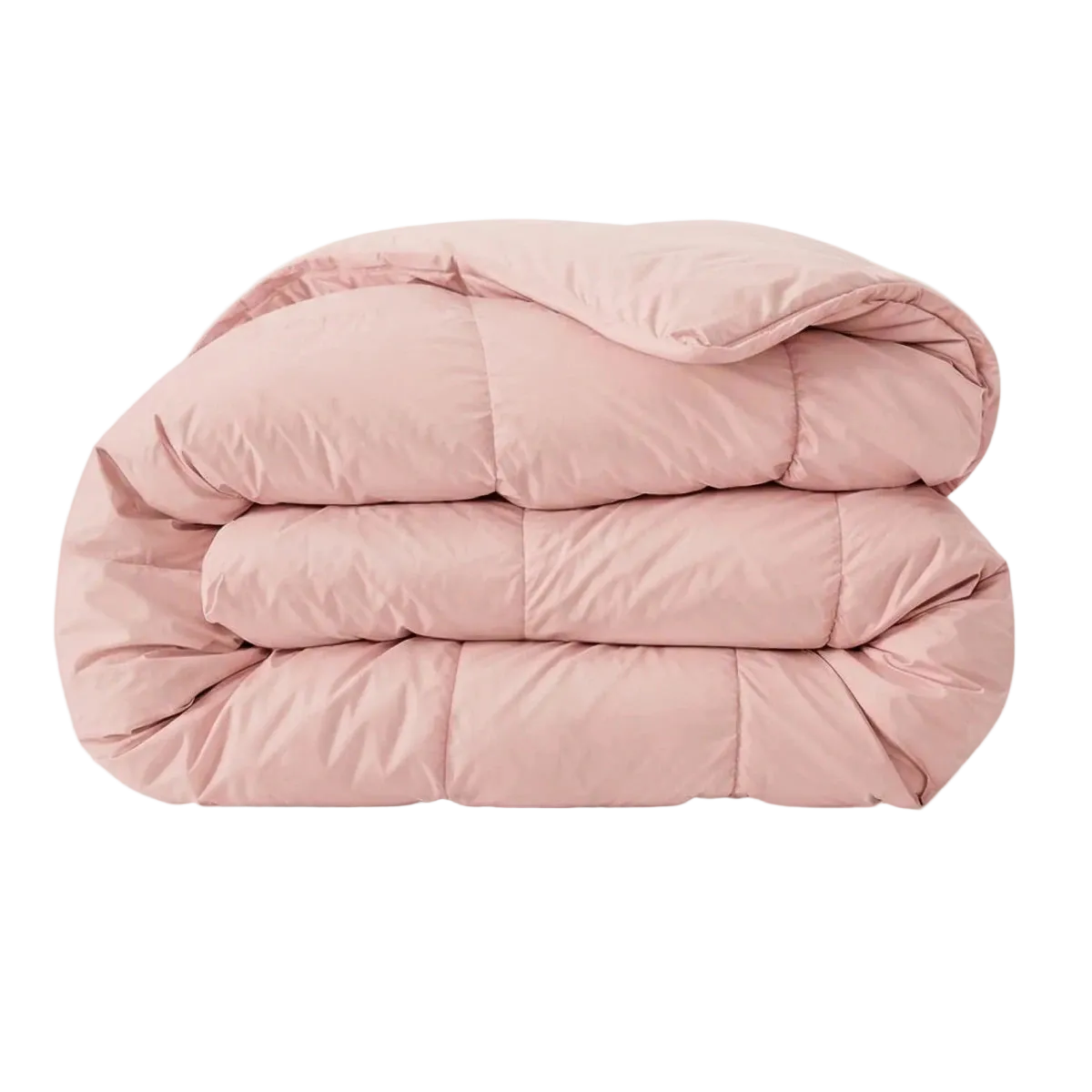 Het Zelesta Pure Uni Dekbed in zacht roze is een gevouwen, lichtroze katoenen dekbed met zichtbare stiksels op een effen witte ondergrond, dat een ademend slaapcomfort biedt.